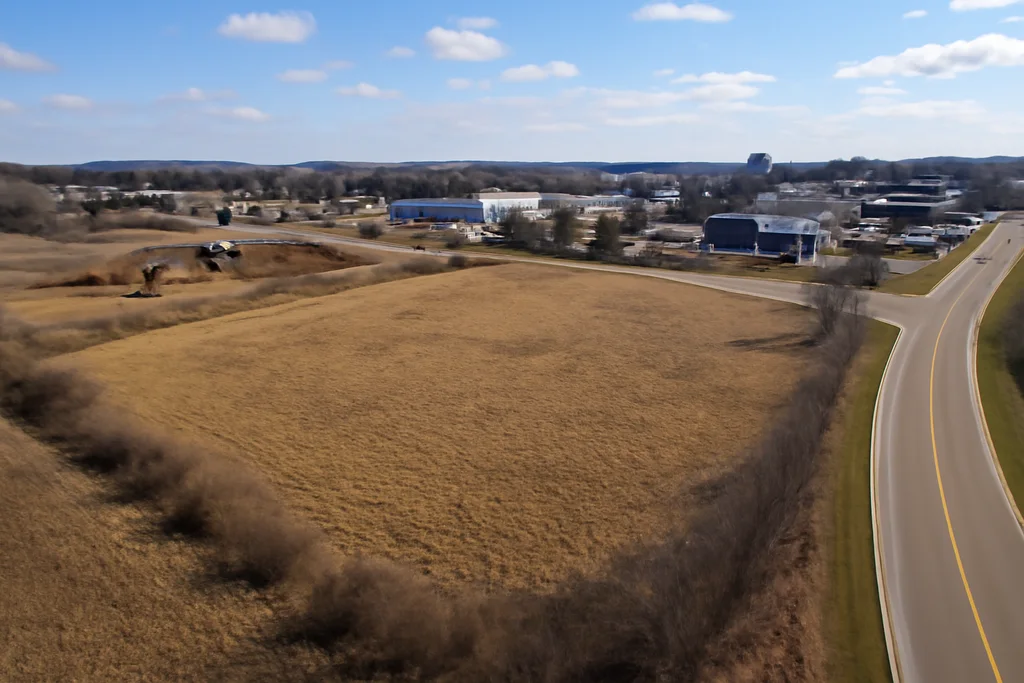 Wisconsin development piece with open land near active construction